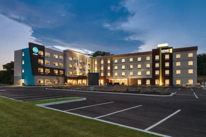 Dusk exterior Easton Home2 Suites and Tru